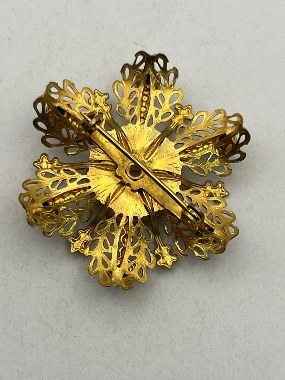Miraculous medal Catholic Virgin Mary blue rhinestone gold tone starburst brooch
